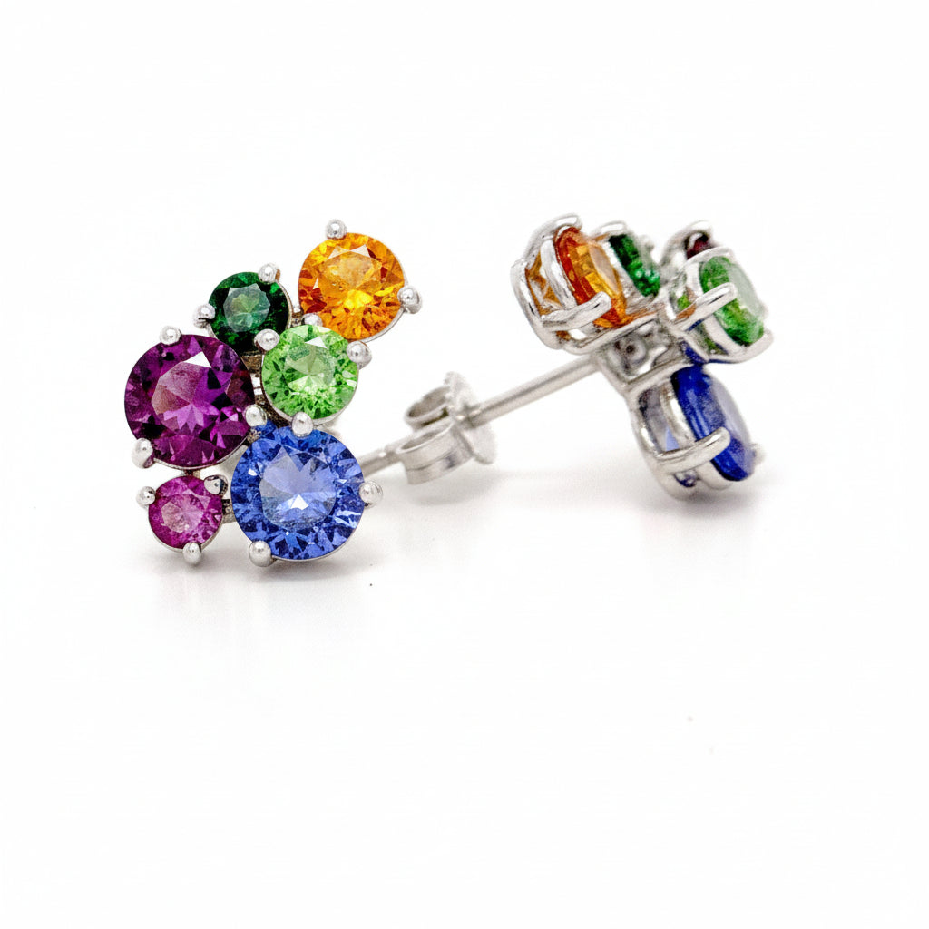 Tanzanite, Spessartite, Tsavorite and Grape Garnet earrings in white gold