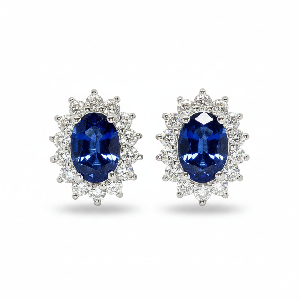 Oval Sapphire and Diamond Halo Earrings in White Gold