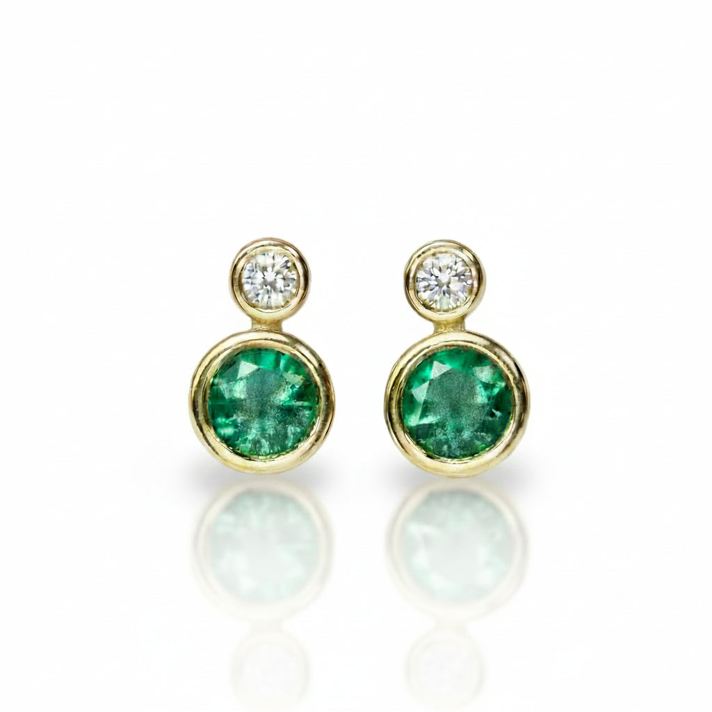 Diamond and Emerald Studs in Gold