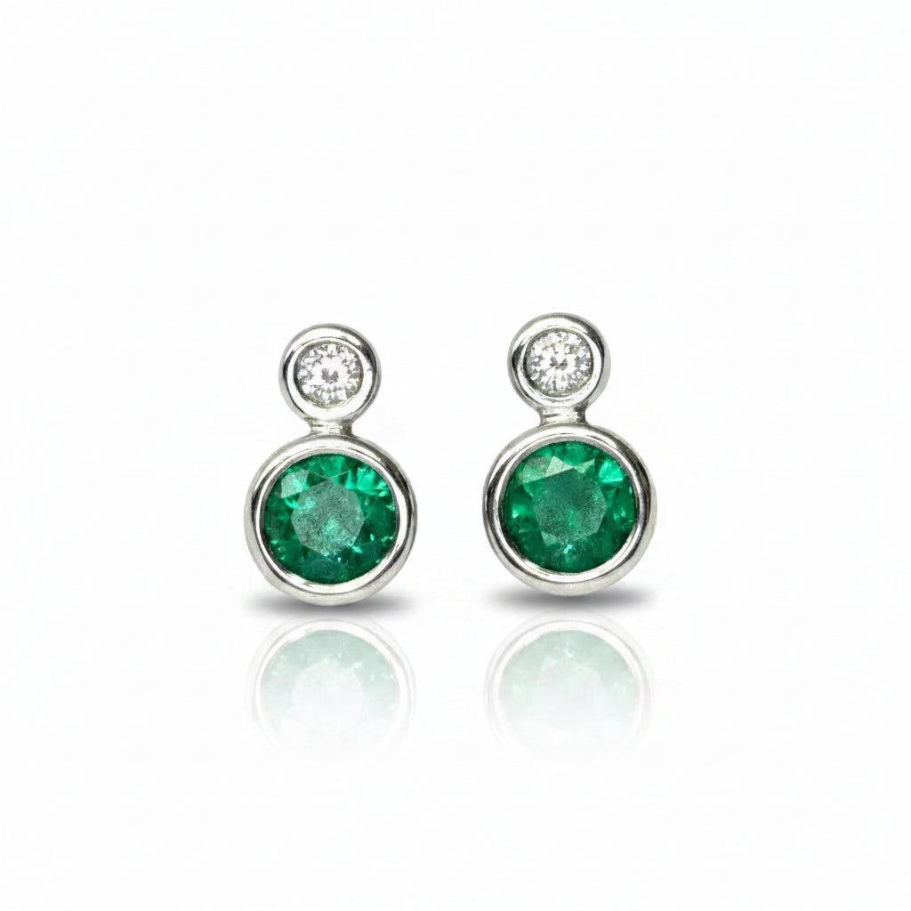 Diamond and Emerald Studs in Gold