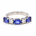 Tanzanite and Diamond Eternity Ring in White Gold image 0